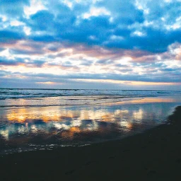 freetoedit pcwaterphotography waterphotography oregoncoast ocean blue coast oregon lincolncity water sunset reflection clouds beach